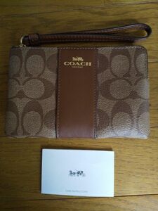 コーチポーチ【新品未使用】COACH ポーチ シグネチャー ブラウン 銭入れ 小物入れりストレートポーチ