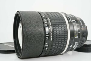  staple product Nikon Ai AF DC Nikkor 105mm f2S seeing at distance single burnt point prime motor non built-in auto focus lens full size correspondence 