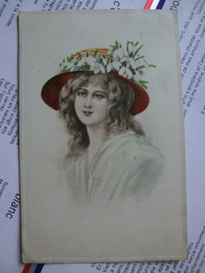 アンティーク　古いポストカード・絵葉書 　* 雪割草の帽子飾りの女性 * 1914年消印 