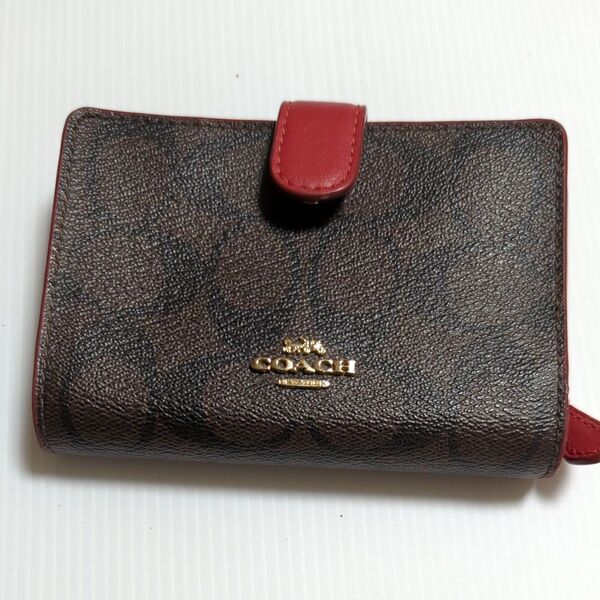 COACH 二つ折り財布