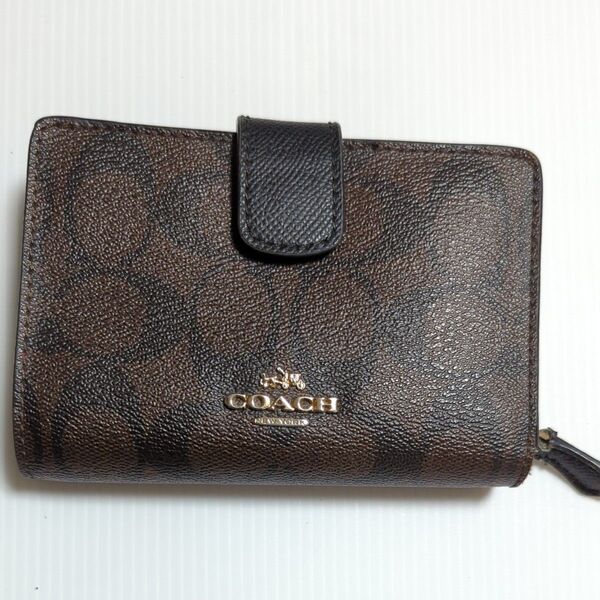 COACH 二つ折り財布