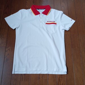 1374【中古】OAKLE Y オークリー ゴルフウェア 半袖 ポロシャツ 白赤 春夏 襟 赤オレンジ山吹色黄色4色 メンズ サイズ M