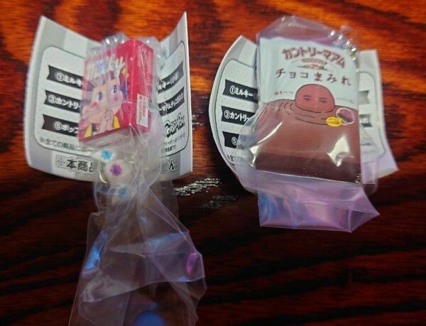 ガチャ)不二家 お菓子 マスコットチャーム2 ミルキー(小箱)・カントリーマアムチョコまみれ