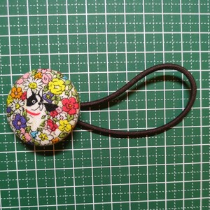  hand made * hair elastic *... button *f Rebel dog . flower * small in present 