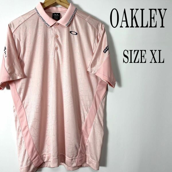 【美品】OAKLEY オークリー 半袖 ロゴ刺繍 プリント ポロシャツ ゴルフウェア ピンク XL