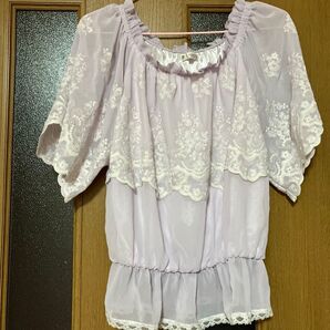 アクシーズファム薄いパープルトップス