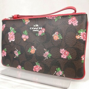 C Φ【商品ランク:B】 コーチ COACH シグネチャー 総柄 花モチーフ ロゴメタル レザー ポーチ 小物入れ マルチケース 茶 ブラウン系