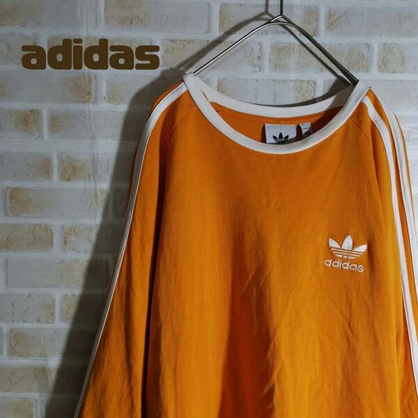 アディダス adidas Tシャツ 長袖 ロンT オレンジ