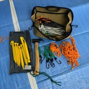  brand unknown peg case set . summarize set present condition goods . summarize set camp mountain climbing tent tarp outdoor BBQfesmc01066829