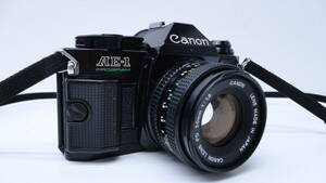 3785 カメラ祭 CANON キャノン フィルムカメラ AE-1 PROGRAM レンズ付 FD 50mm f1.8 中古品 ファインダー汚れあり 空シャッター確認済み