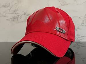 【未使用品】421KA お洒落★OAKLEY オークリー キャップ 帽子 CAP お洒落なフロントデザインにレッドの伸縮素材《伸縮前56㎝～60㎝位迄》