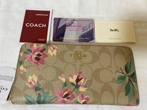 05 COACH コーチ 長財布 ラウンドファスナー 茶色系　花柄