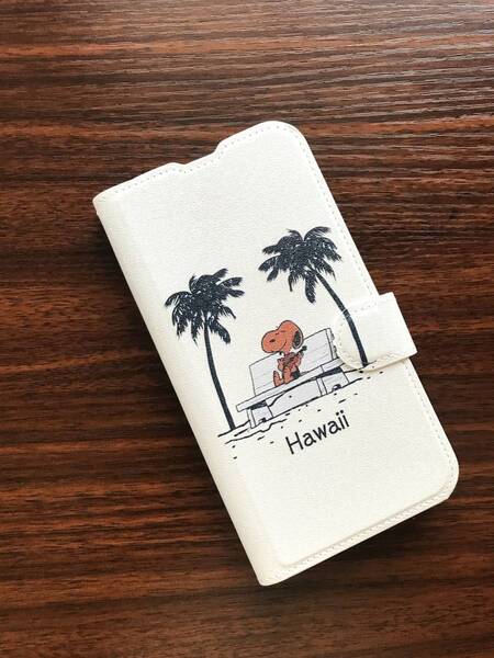 即決★iPhone 14 / iPhone 13 用カード入れ スタンド機能付手帳型レザーケース★HAWAII ハワイ日焼けスヌーピー【白】