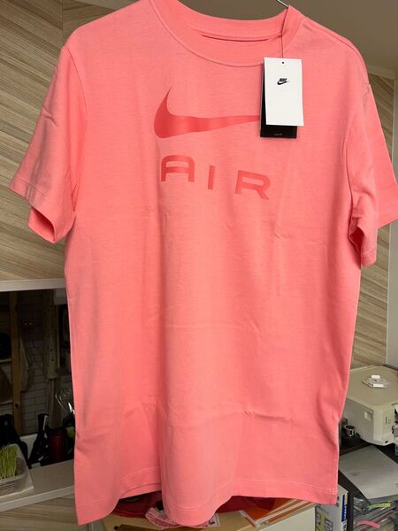 ナイキ Tシャツ Mサイズ レディース NIKE ピンク系