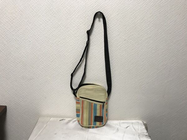 本物アミナAminaキャンバスミニショルダーバッグボディポーチポシェットバックレディースメンズゴルフ旅行トラベルイエロー柄ネパール製