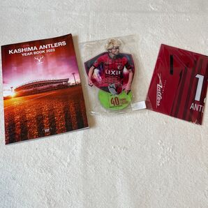 鹿島アントラーズYEARBOOK2023 40鈴木優磨アクリルスタンド 12サポーターナンバークリアファイル