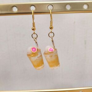 ハンドメイド ピアス フロート オレンジ風