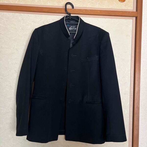 中古古着 カンコー 学ラン学生服 男子 上下 標準型学生服 ドライウォッシュ洗濯機使用可 黒 袖長め ボタンあり夏用ズボン股下約77