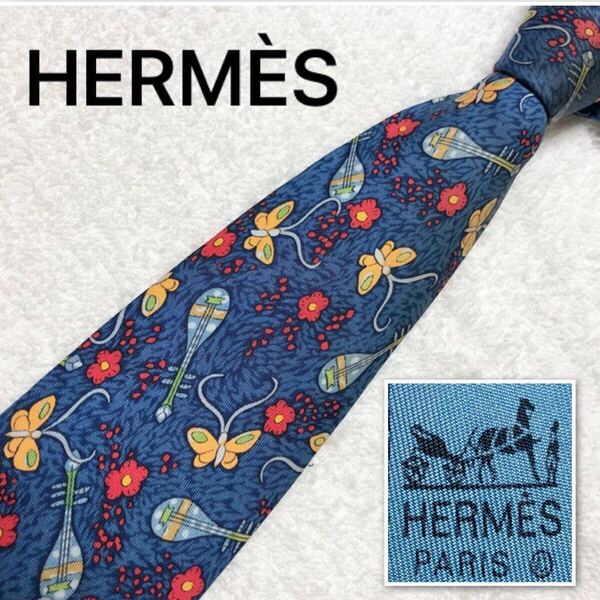 HERMES エルメス ネクタイ 花 チョウ ウクレレ 総柄 シルク100% フランス製 ブルー系 ビジネス