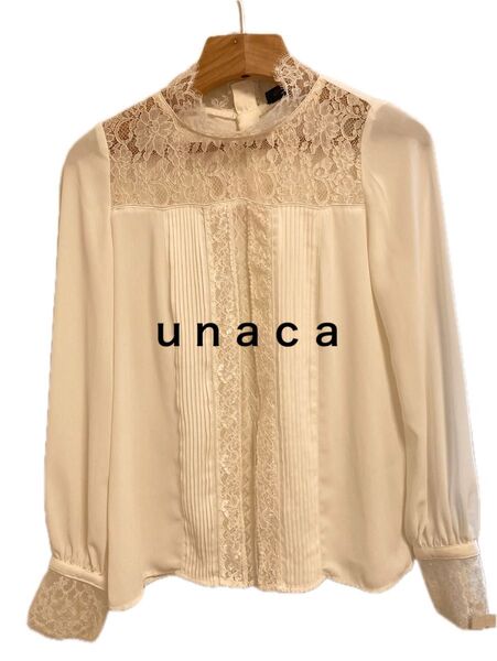 【unacaレースハイネックブラウス】 トップス 長袖 アイボリー レース くるみボタン レースハイネック