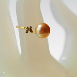  south . Golden pearl White Butterfly pearl ring 
