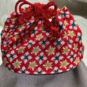 赤い花柄の巾着型お宮参り用品 しちごさん 七五三