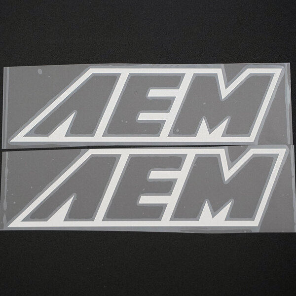 新品・未使用☆AEM カッティングステッカー シルバー 2枚 縦56mm×横200mm |ロゴ|デカール|切り文字|切文字|新品|送料無料|匿名配送