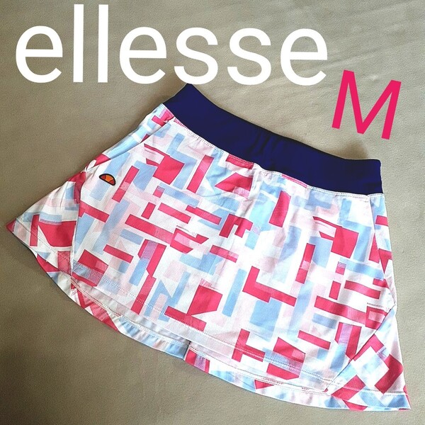 【美品】ellesse エレッセ テニス バドミントン テニス スコート ゲームスコート スカート 総柄 アシンメトリー レディースM