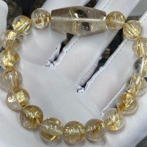 ルチル クオーツ ブレスレット ビーズ 約10.6mm-11.3mm 樽約30mm×15mm 腕周り約17.5cm 1115