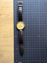 良品 レア ヴィンテージ TISSOT ティソ SWISS MADE デイト ゴールド T882K 純正尾錠 クオーツ メンズ 腕時計_画像2