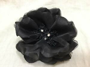  corsage . flower black approximately 10. sending 120