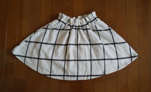 * check pattern. Mini flared skirt size M *