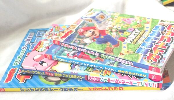 スーパーアリオの小さい漫画本など4冊セット イラストブック1冊.傑作選1冊.まるわかりガイドブック2冊