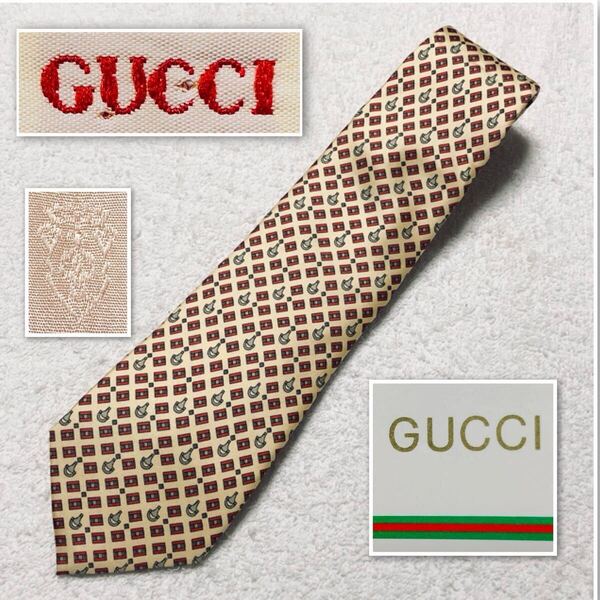 ■未使用タグ付き■GUCCI グッチ ネクタイ 長方形 あぶみ 総柄 シルク100% イタリア製 イエロー系