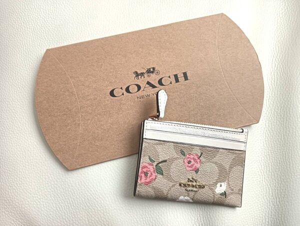 【限定ラスト1点】コーチCOACHシグニチャー花柄フラワー茶ブラウンミニスキニー