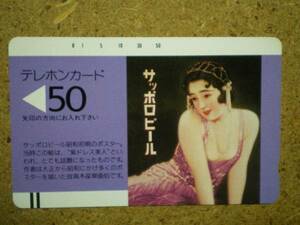 syok・110-6011 サッポロビール 紫ドレス美人 テレカ