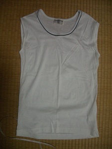  white. tank top ( no sleeve ) neck around black. accent 