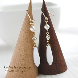 *+angelo+ Czech daga-. rhinestone. earrings (p-117) chock white G simple Kirakira titanium resin earrings 